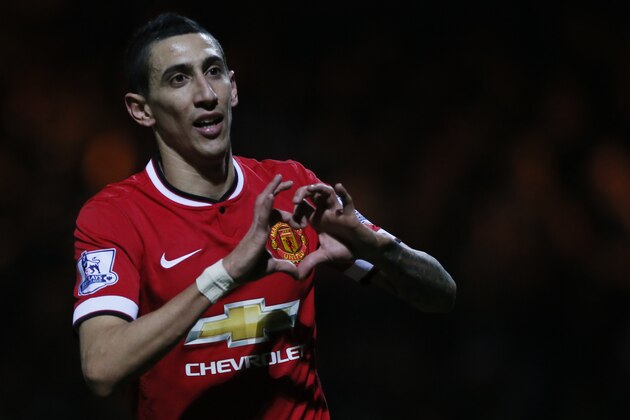 Manchester United’s Angel Di Maria celebrates after scoring his sides second goal of the game during their English FA Cup third round soccer match between Yeovil Town and Manchester United at Huish Park stadium in Yeovil, England, Sunday, Jan.  4, 2015 . (AP Photo/Alastair Grant)