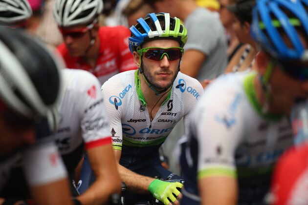 RODEZ, FRANCE - JULY 18:  Adam Yates of Great Britain and the Orica GreenEdge looks on at the start of stage fourteen of the 2015 Tour de France, a 178km stage between Rodez and Mende, on July 18, 2015 in Rodez, France.  (Photo by Bryn Lennon/Getty Images)