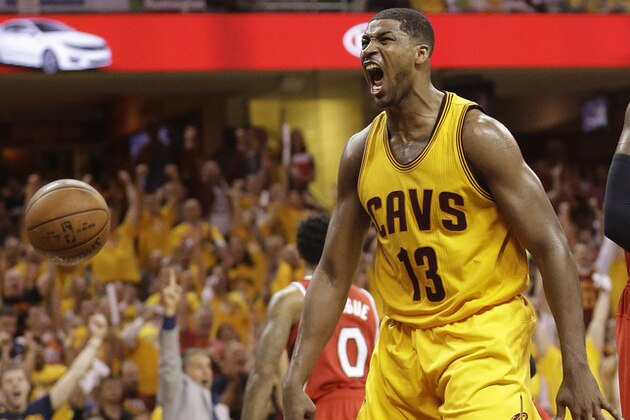 Cleveland Cavaliers center Tristan Thompson (13) reacts after dunking the ball against the Atlanta Hawks in the second half of Game 4 of the NBA basketball Eastern Conference Finals, Tuesday, May 26, 2015, in Cleveland. (AP Photo/Tony Dejak)