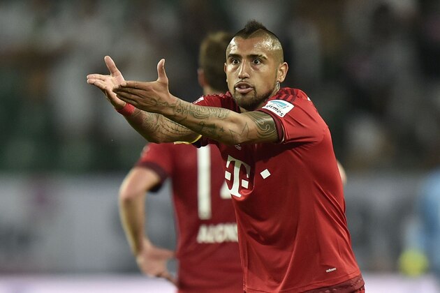 Bayern's Arturo Vidal from Chile reacts during the German Supercup final soccer match between VfL Wolfsburg and Bayern Munich in Wolfsburg, Germany, Saturday, Aug. 1, 2015.  Wolfsburg defeated Bayern with 6-5 after penalties. (AP Photo/Martin Meissner)