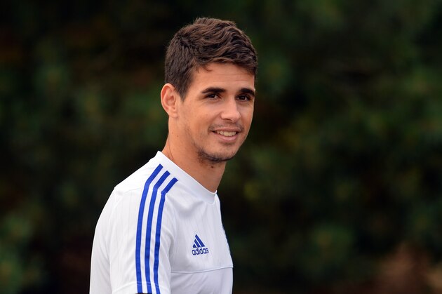 Chelsea's Brazilian midfielder Oscar attends a team training session at Chelsea's training ground in Stoke D'Abernon, south of London, on July 31, 2015, ahead of their FA Community Shield match against Arsenal on Sunday. AFP PHOTO / GLYN KIRK

NOT FOR MARKETING OR ADVERTISING USE / RESTRICTED TO EDITORIAL USE        (Photo credit should read GLYN KIRK/AFP/Getty Images)