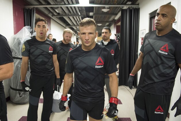 CHICAGO, IL - JULY 25:  UFC bantamweight champion TJ Dillashaw warms up backstage before facing Renan Barao of Brazil in their UFC bantamweight championship bout during the UFC event at the United Center on July 25, 2015 in Chicago, Illinois. (Photo by Mike Roach/Zuffa LLC/Zuffa LLC via Getty Images)