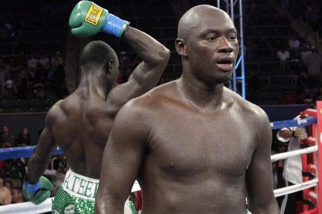 Antonio Tarver, center, walks away from Lateef Kayode, of Nigeria, after their cruiserweight boxing match in Carson, Calif., Saturday, June 2, 2012. The fight ended in a draw. (AP Photo/Jae C. Hong)