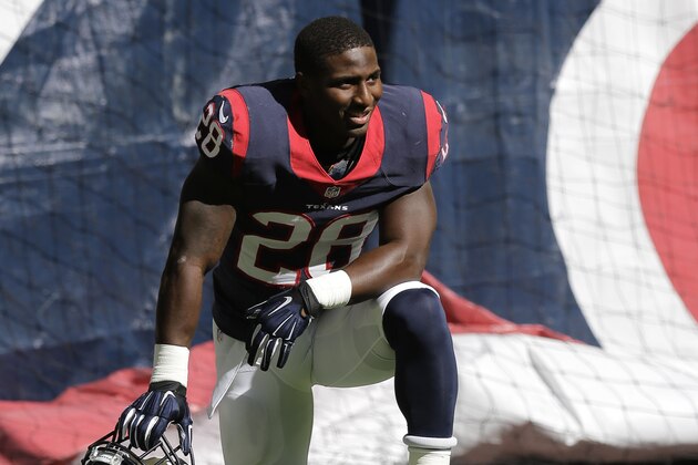 Houston Texans' Alfred Blue (28) prepares for an NFL football game against the Cincinnati Bengals, Sunday, Nov. 23, 2014, in Houston. (AP Photo/Patric Schneider)