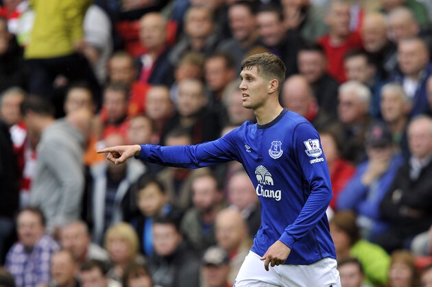 Everton's John Stones in action during their English Premier League soccer match against Liverpool at Anfield in Liverpool, England, Saturday Sept. 27, 2014. (AP Photo/Clint Hughes)