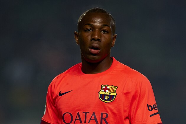 ELCHE, SPAIN - JANUARY 15:  Adama Traore of Barcelona looks on during the Copa del Rey Round of 16 Second Leg match between Elche FC and FC Barcelona at Estadio Manuel Martinez Valero on January 15, 2015 in Elche, Spain.  (Photo by Manuel Queimadelos Alonso/Getty Images)