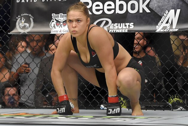 Ronda Rousey gets ready to fight Cat Zingano in a UFC 184 mixed martial arts bantamweight title bout, Saturday, Feb. 28, 2015, in Los Angeles. Rousey won after Zingano tapped out 14 seconds into the first round. (AP Photo/Mark J. Terrill)