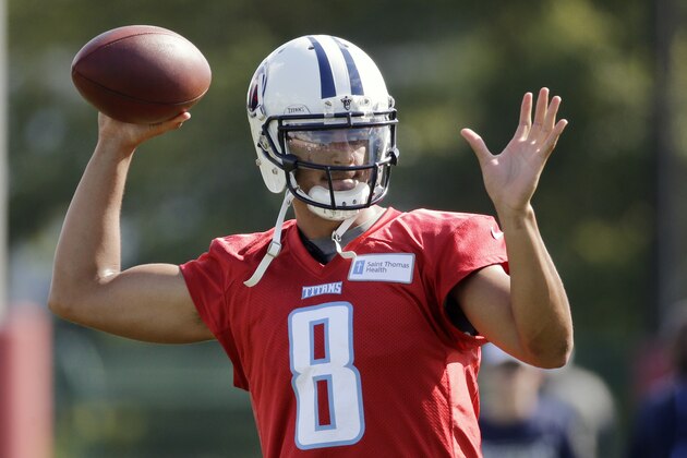 Tennessee Titans quarterback Marcus Mariota tosses a ball during NFL football training camp Saturday, Aug. 1, 2015, in Nashville, Tenn. (AP Photo/Mark Humphrey)