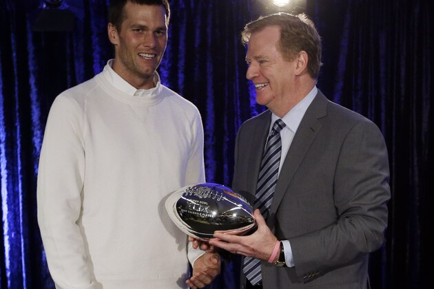 New England Patriots quarterback Tom Brady poses with NFL Commissioner Rodger Goodell during a news conference after the NFL Super Bowl XLIX football game Monday, Feb. 2, 2015, in Phoenix, Ariz. Brady was named the game’s most valuable player. (AP Photo/David J. Phillip)