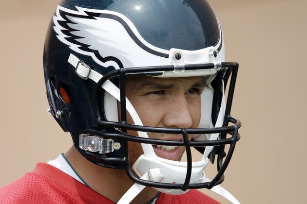 Philadelphia Eagles quarterback Sam Bradford walks to the field for NFL football minicamp, Tuesday, June 16, 2015, in Philadelphia. (AP Photo/Matt Rourke)