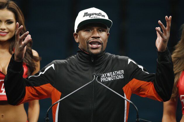 File- This May 2, 2015, file photo shows Floyd Mayweather Jr. gesturing during a press conference following his welterweight title fight in Las Vegas. Mayweather said in an upcoming interview with Showtime that at this moment he's not interested in a rematch with Manny Pacquiao
