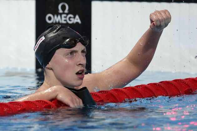 United States' Katie Ledecky celebrates after winning the women's 1500m freestyle final at the Swimming World Championships in Kazan, Russia, Tuesday, Aug. 4, 2015. (AP Photo/Michael Sohn)