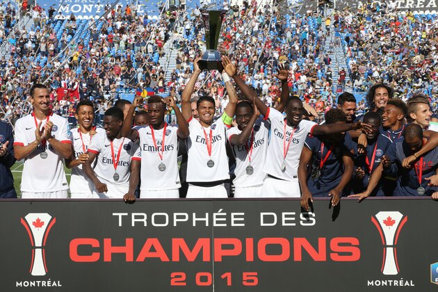 MONTREAL, QC  - AUGUST 1: Captain of PSG Thiago Silva lifts the trophy as PSG wins the 2015 Trophee des Champions between Paris Saint-Germain (PSG) and Olympique Lyonnais (OL) at Stade Saputo on August 1, 2015 in Montreal, Quebec, Canada. (Photo by Jean Catuffe/Getty Images)