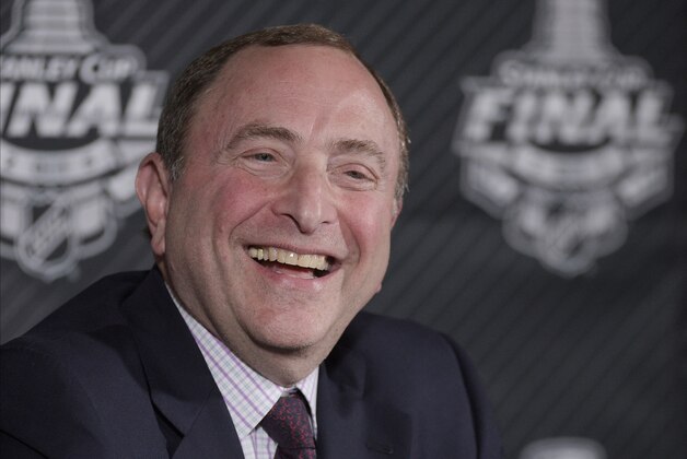 NHL Commissioner, Gary Bettman talks during a news conference before Game 1 of the NHL hockey Stanley Cup Final between the Tampa Bay Lightning and the Chicago Blackhawks in Tampa, Fla., Wednesday, June 3, 2015.  (AP Photo/Phelan M. Ebenhack)