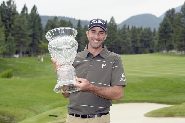 RENO, NV - AUGUST 03:  Geoff Ogilvy of Australia holds the trophy after winning the Barracuda Championship at the Montreux Golf and Country Club on August 3, 2014 in Reno, Nevada. Ogilvy won the event with a total of 49 points.  (Photo by Robert Laberge/Getty Images)