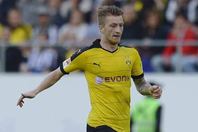 ST GALLEN, SWITZERLAND - JULY 25: Marco Reus of Dortmund controls the ball during the friendly match between Juventus and Borussia Dortmund on July 25, 2015 in St Gallen, Switzerland.  (Photo by Daniel Kopatsch/Getty Images)