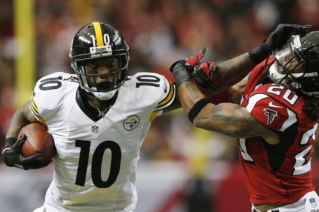 Pittsburgh Steelers wide receiver Martavis Bryant (10) is tackled by Atlanta Falcons free safety Dwight Lowery (20) during the first half of an NFL football game, Sunday, Dec. 14, 2014, in Atlanta. (AP Photo/Brynn Anderson)