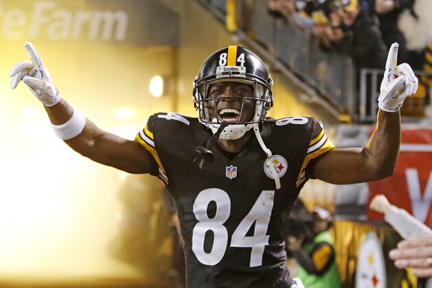 Pittsburgh Steelers wide receiver Antonio Brown (84) is introduced before an NFL wildcard playoff football game against the Baltimore Ravens, Saturday, Jan. 3, 2015, in Pittsburgh. (AP Photo/Gene J. Puskar)