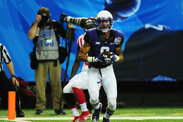 ATLANTA, GA - DECEMBER 31:  Josh Doctson #9 of the TCU Horned Frogs completes a touchdown reception in the third quarter against the Ole Miss Rebels during the Chik-fil-A Peach Bowl at Georgia Dome on December 31, 2014 in Atlanta, Georgia.  (Photo by Scott Cunningham/Getty Images)