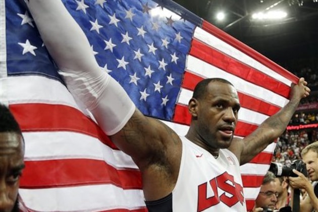 United States' LeBron James celebrates after the men's gold medal basketball game at the 2012 Summer Olympics, Sunday, Aug. 12, 2012, in London. USA won 107-100. (AP Photo/Eric Gay)