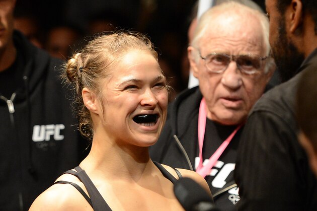 Dec 28, 2013; Las Vegas, NV, USA;   Ronda Rousey gets ready to enter the cage for her UFC Women's Bantamweight Championship Bout against Miesha Tate (not pictured) at the MGM Grand Garden Arena. Rousey won. Mandatory Credit: Jayne Kamin-Oncea-USA TODAY Sports