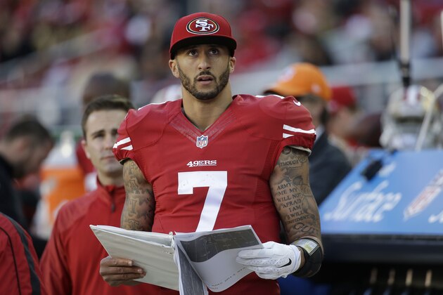 San Francisco 49ers quarterback Colin Kaepernick (7) stands on the sideline during the third quarter of an NFL football game against the Arizona Cardinals in Santa Clara, Calif., Sunday, Dec. 28, 2014. (AP Photo/Marcio Jose Sanchez) San Francisco 49ers quarterback Colin Kaepernick (7) stands on the sideline during the third quarter of an NFL football game against the Arizona Cardinals in Santa Clara, Calif., Sunday, Dec. 28, 2014. (AP Photo/Marcio Jose Sanchez)