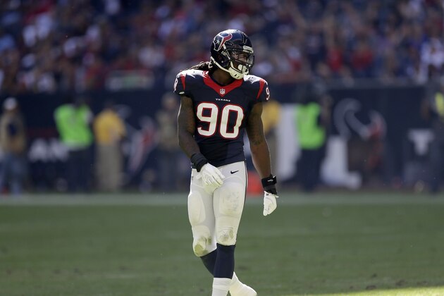 Houston Texans outside linebacker Jadeveon Clowney (90) lines up against the Cincinnati Bengals during the second quarter of an NFL football game, Sunday, Nov. 23, 2014, in Houston. (AP Photo/David J. Phillip)