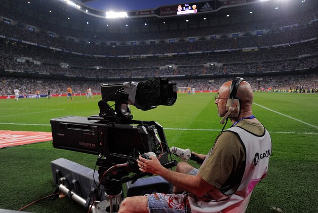 MADRID, SPAIN - MAY 09:  A camera operator films the La Liga match between Real Madrid CF and Valencia CF at the estadio Santiago Bernabeu on May 9, 2015 in Madrid, Spain. The players union have called an indefinate strike on May 16th over disagreements on how revenue from a proposed new law will be divided amongst top teams and lower leagues in Spain. (Photo by Denis Doyle/Getty Images)