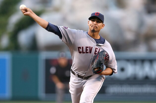 ANAHEIM, CA - AUGUST 04:  Carlos Carrasco #59 of the Cleveland Indians throws a pitch against the Los Angeles Angels of Anaheim at Angel Stadium of Anaheim on August 4, 2015 in Anaheim, California.  (Photo by Stephen Dunn/Getty Images)