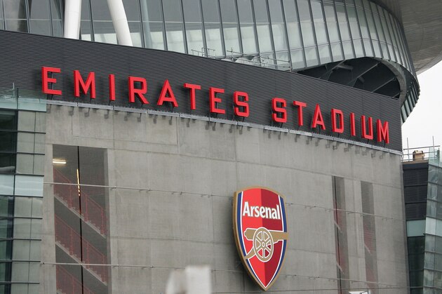 The facade of Arsenal's new Emirate Stadium at Ashburton Grove in London, Tuesday, April 25, 2006. Arsenal football team will move to the new stadium starting from the opening of next season,  from the old Highbury stadium where it will host the last Arsenal's Premiership soccer match on Sunday May 7. (AP Photo/Sang Tan)