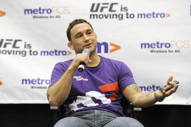COMMERCIAL IMAGE - In this photograph taken by AP Images for MetroPCS, MetroPCS introduces Team Metro UCF fighter Frankie Edgar during a press conference, Thursday, April, 19, 2012, in Atlanta. (John Amis/AP Images for MetroPCS)