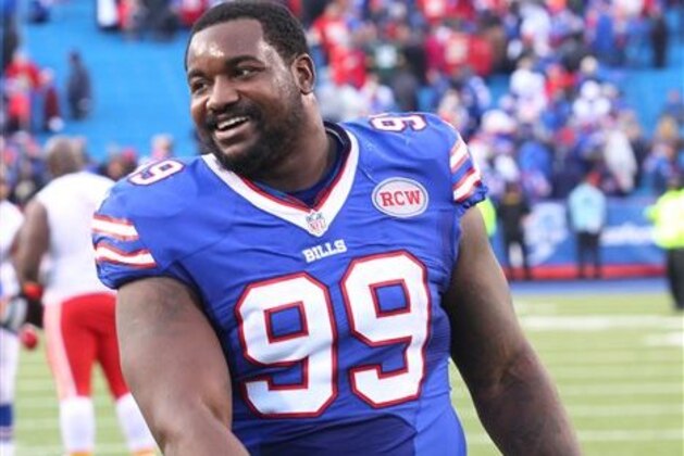 FILE - In this Nov. 9, 2014, file photo, Buffalo Bills defensive tackle Marcell Dareus (99) walks off the field after an NFL football game against the Kansas City Chiefs in Orchard Park, N.Y. Bills defensive tackle Marcell Dareus will miss the season opener after being suspended without pay by the NFL for violating the league's substance abuse policy. The NFL announced the suspension on Thursday, May 21, 2015.  (AP Photo/Bill Wippert, File)