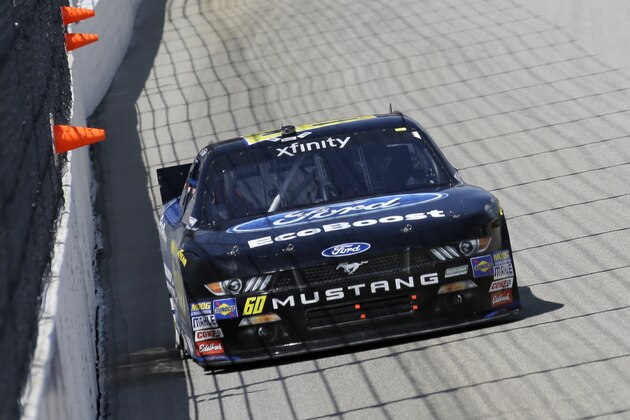 Chris Buescher (60) drives his car during the NASCAR Xfinity series auto race at Chicagoland Speedway, Sunday, June 21, 2015, in Joliet, Ill. (AP Photo/Nam Y. Huh)