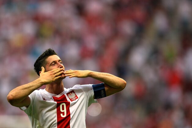 Robert Lewandowski of Poland reacts after scoring a goal during the Euro 2016 Group D qualifying football match Poland vs Georgia in Warsaw, Poland on June 13, 2015.  AFP PHOTO / JANEK SKARZYNSKI        (Photo credit should read JANEK SKARZYNSKI/AFP/Getty Images)