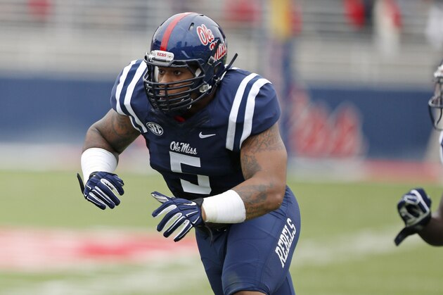 Mississippi defensive tackle Robert Nkemdiche (5) runs to the line of scrimmage in the first half of an NCAA college football game against Louisiana-Lafayette at Vaught-Hemingway Stadium in Oxford, Miss., Saturday, Sept. 13, 2014. No. 14 Mississippi won 56-15. (AP Photo/Rogelio V. Solis)