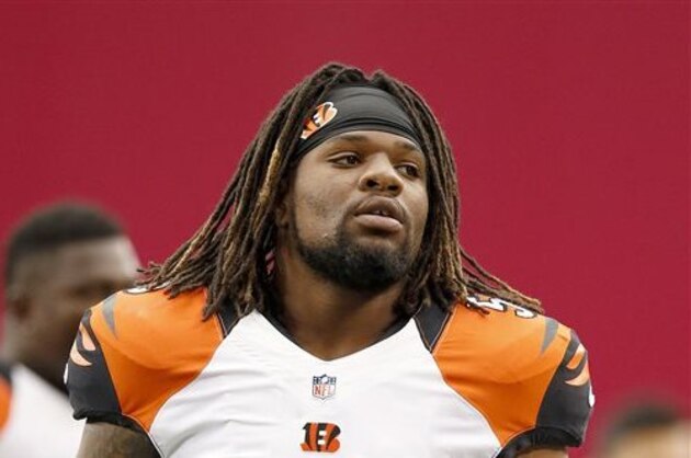 FILE - In this Aug. 24, 2014, file photo, Cincinnati Bengals' Vontaze Burfict stretches out with teammates prior to an NFL preseason football game against the Arizona Cardinals in Glendale, Ariz. Burfict had surgery to clean out his left knee on Wednesday, Oct. 29, 2014,  and will miss at least the next two games. (AP Photo/Ross D. Franklin, File)