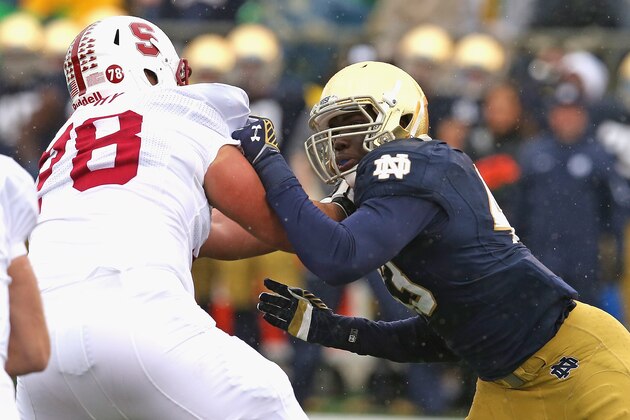 SOUTH BEND, IN - OCTOBER 04: Kolin Hill #43 of the Notre Dame Fighting Irish rushes against Kyle Murphy #78 of the Standford Cardinal at Notre Dame Stadium on October 4, 2014 in South Bend, Indiana. Notre Dame defeated Standford 17-14. (Photo by Jonathan Daniel/Getty Images)