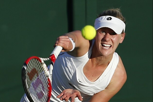 Alison Riske of the United States serves to Lucie Safarova of the Czech Republic  during the women's singles first round match at the All England Lawn Tennis Championships in Wimbledon, London, Monday June 29, 2015. (AP Photo/Alastair Grant)