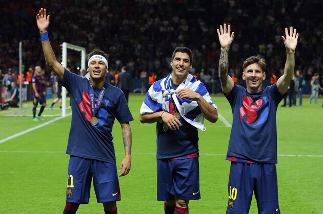 BERLIN, GERMANY - JUNE 6: Neymar Jr, Luis Suarez and Lionel Messi of Barcelona celebrate the victory after the UEFA Champions League Final between Juventus Turin and FC Barcelona at Olympiastadion on June 6, 2015 in Berlin, Germany. (Photo by Jean Catuffe/Getty Images)