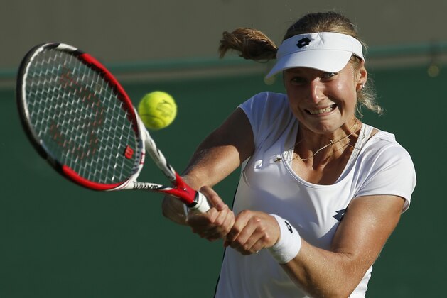Ekaterina Makarova of Russia returns to Sachia Vickery of the United States during their women's singles first round match at the All England Lawn Tennis Championships in Wimbledon, London, Tuesday June 30, 2015. (AP Photo/Alastair Grant)