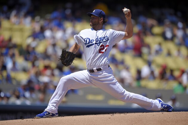 Los Angeles Dodgers starting pitcher Clayton Kershaw throws to the plate during the first inning of a baseball game against the Los Angeles Angels, Saturday, Aug. 1, 2015, in Los Angeles. (AP Photo/Mark J. Terrill)