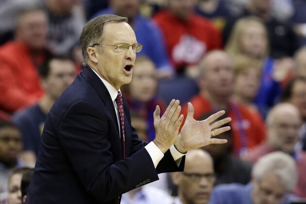 Oklahoma head coach Lon Kruger cheers his team in the second half of an NCAA tournament college basketball game against Dayton in the Round of 32 in Columbus, Ohio, Sunday, March 22, 2015. (AP Photo/Tony Dejak)