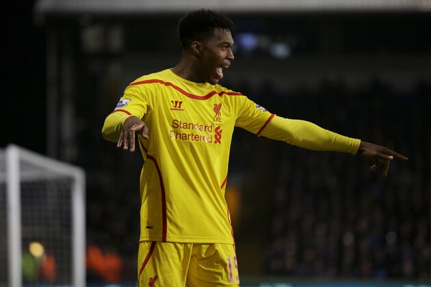 Liverpool's Daniel Sturridge celebrates scoring his side's first goal during the English FA Cup fifth round soccer match between Crystal Palace and Liverpool at Selhurst Park stadium in London, Saturday, Feb. 14, 2015.  (AP Photo/Matt Dunham)