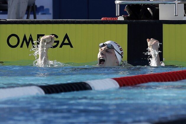 Zane Grothe celebrates his win in the men's 400-meter freestyle in the U.S. swimming nationals Thursday, Aug. 6, 2015, in San Antonio. (AP Photo/Eric Gay)