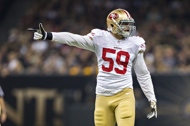 NEW ORLEANS, LA - NOVEMBER 9:  Aaron Lynch #59 of the San Francisco 49ers points to movement on the line during a game against the New Orleans Saints at Mercedes-Benz Superdome on November 9, 2014 in New Orleans, Louisiana.  (Photo by Wesley Hitt/Getty Images)