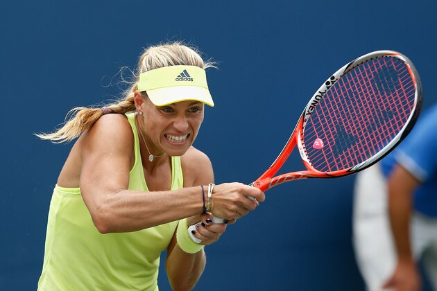 STANFORD, CA - AUGUST 6: Angelique Kerber of Germany plays against Ana Konjuh of Croatia during day four of the Bank of the West Classic at the Stanford University Taube Family Tennis Stadium on August 6, 2015 in Stanford, California. (Photo by Lachlan Cunningham/Getty Images) STANFORD, CA - AUGUST 6: Angelique Kerber of Germany plays against Ana Konjuh of Croatia during day four of the Bank of the West Classic at the Stanford University Taube Family Tennis Stadium on August 6, 2015 in Stanford, California. (Photo by Lachlan Cunningham/Getty Images)