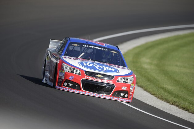 Sprint Cup Series driver AJ Allmendinger (47) drives through the first turn during practice for the NASCAR Brickyard 400 auto race at Indianapolis Motor Speedway in Indianapolis, Friday, July 24, 2015. (AP Photo/Michael Conroy)