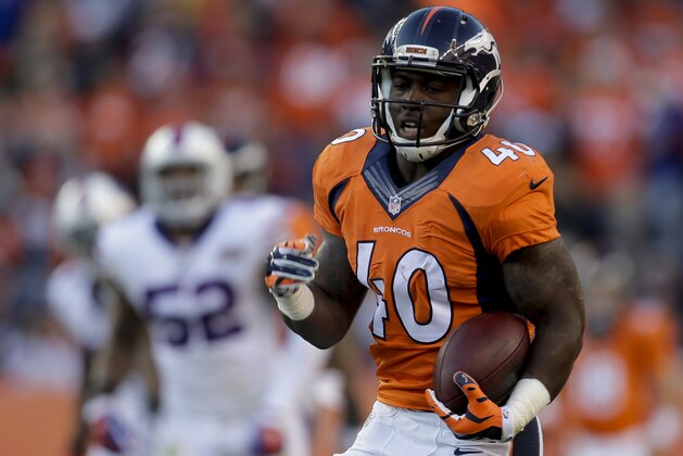 Denver Broncos running back Juwan Thompson runs against the Buffalo Bills during the second half in an NFL football game Sunday, Dec. 7, 2014, in Denver. (AP Photo/Joe Mahoney)