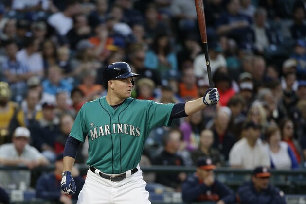 Seattle Mariners' Mark Trumbo in action in a baseball game Friday, June 19, 2015, in Seattle. (AP Photo/Elaine Thompson)