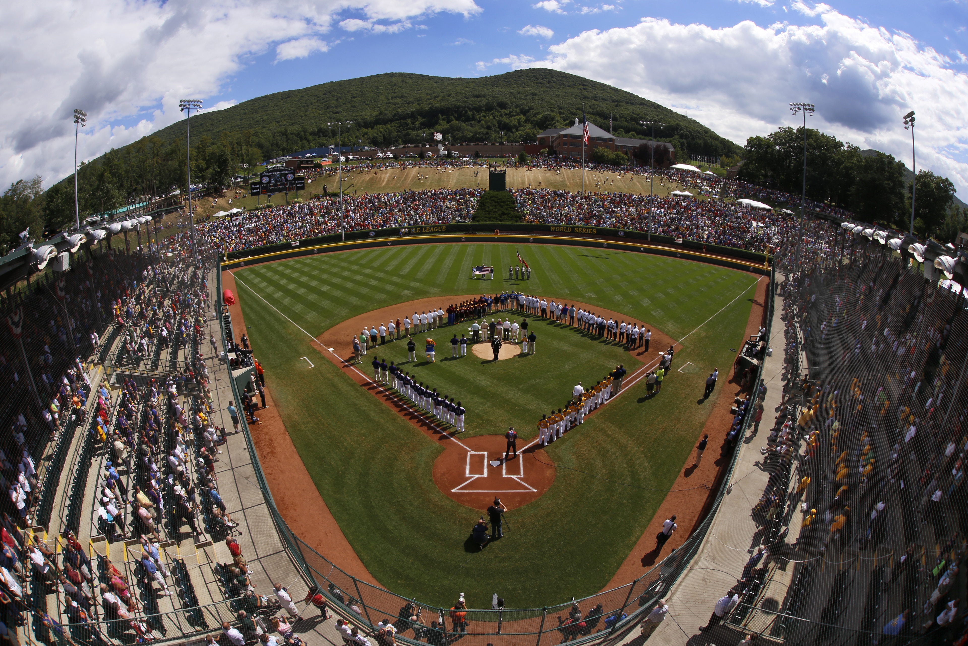 South Korea lines the third baseline and Chicago lines the first baseline at Lamade Stadium during the National Anthem before the Little League World Series Championship baseball game in South Williamsport, Pa., Sunday, Aug. 24, 2014. (AP Photo/Gene J. Puskar South Korea lines the third baseline and Chicago lines the first baseline at Lamade Stadium during the National Anthem before the Little League World Series Championship baseball game in South Williamsport, Pa., Sunday, Aug. 24, 2014. (AP Photo/Gene J. Puskar